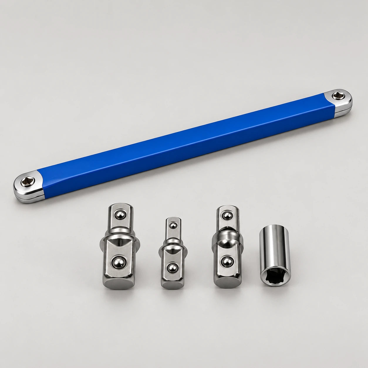 Blue wrench with the three adapters and one socket included in each complete set